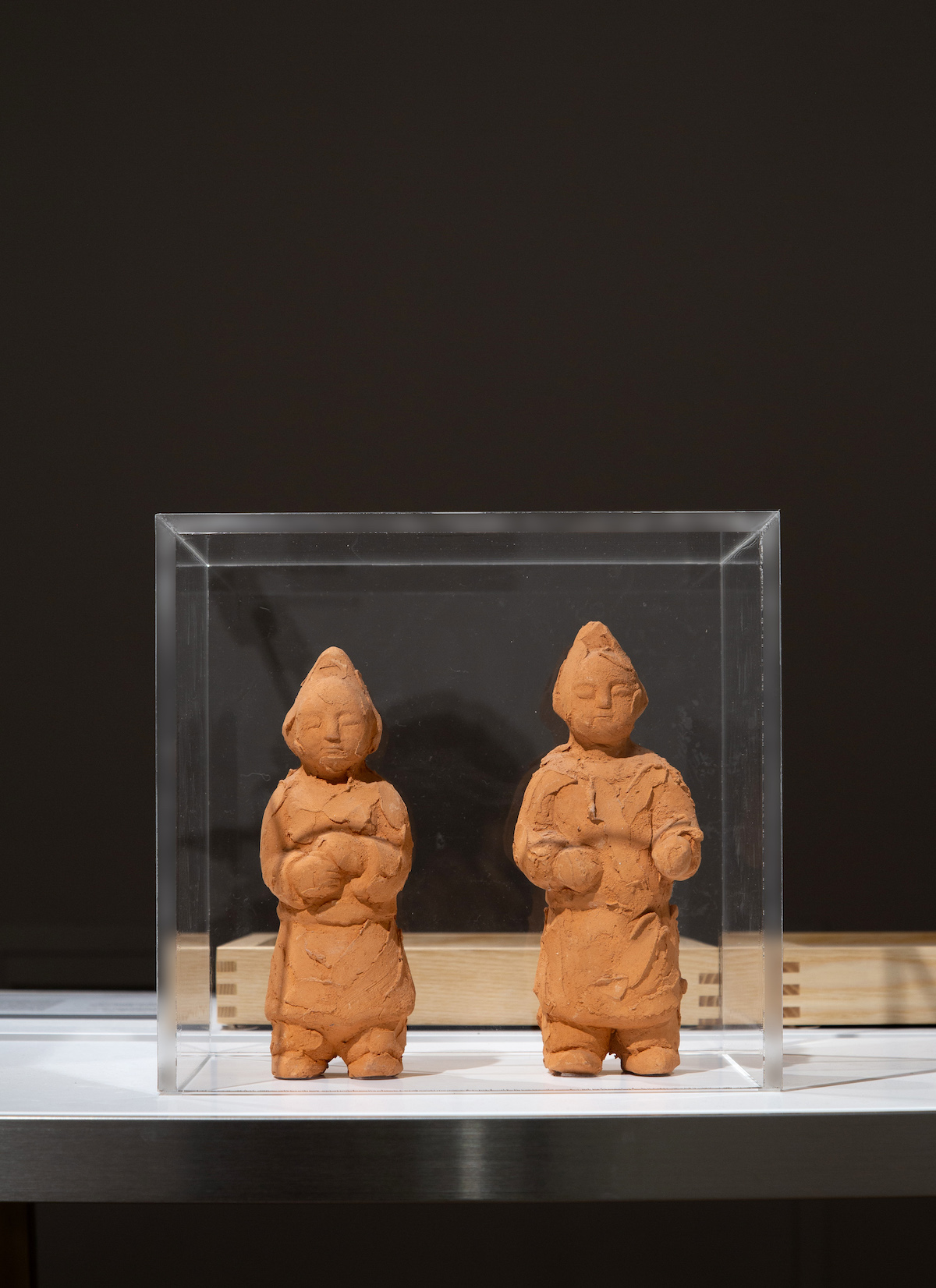 Jheon Soocheon, clay doll from
                  T’ou Amongst Wandering Planets: Spirit of the Korean
                    People
                  , 1995, teracotta, 19.5 × 5 × 6 cm (2). Provided by Bf.
                  photograph by Hyunjung Kwon.